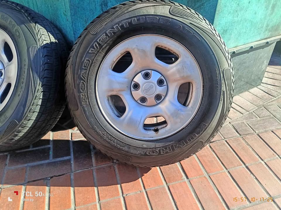 Tires on 5-Lug Rims - Excellent Condition. P215 75R16's KUMHO ROAD VENTURE"s